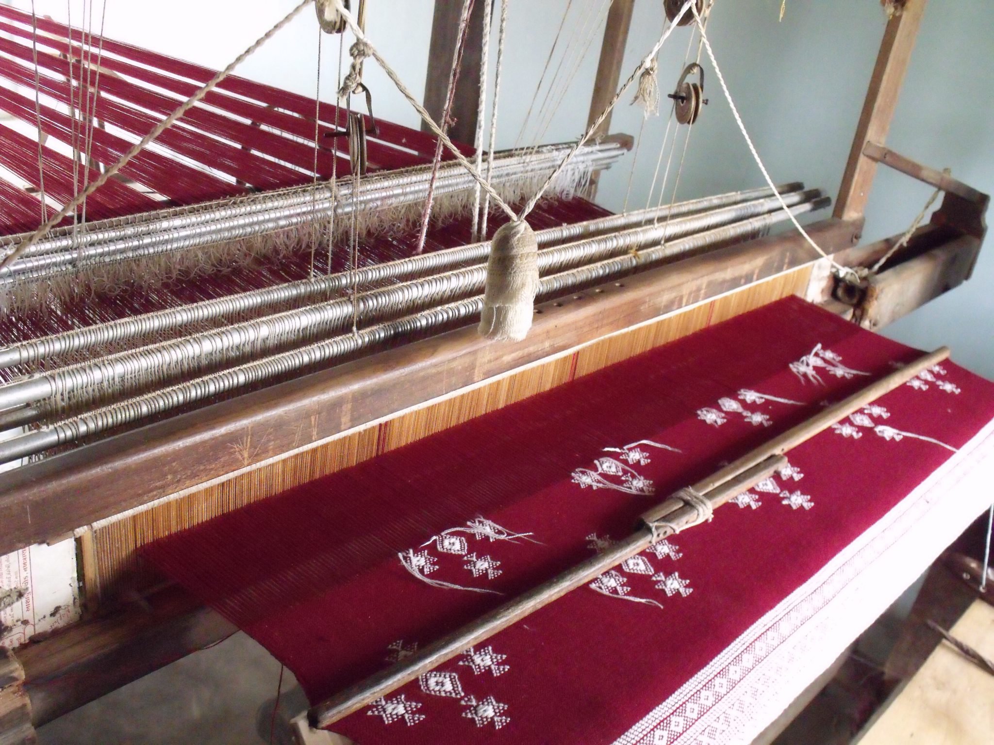 A traditional loom used to weave a rug